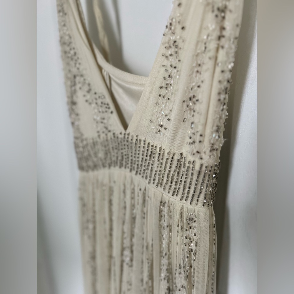 Gorgeous beaded creme coloured dress